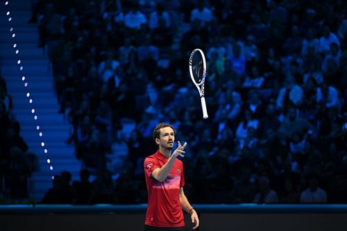 Daniil Medvedev tosses his racket into the air in frustration after losing to Taylor Fritz at the 2024 Nitto ATP Finals (Source: Getty)