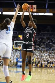 Joyce Edwards attempts a shot in the UCLA loss. (Image Credits: Joe Scarnici, Getty Images)