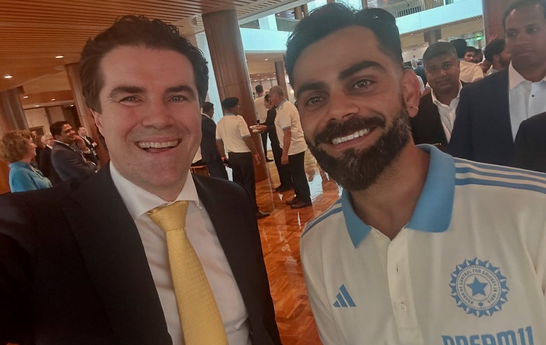 Australian minister Tim Watts (left) with Virat Kohli. (Pic: Instagram/timwattsmp)