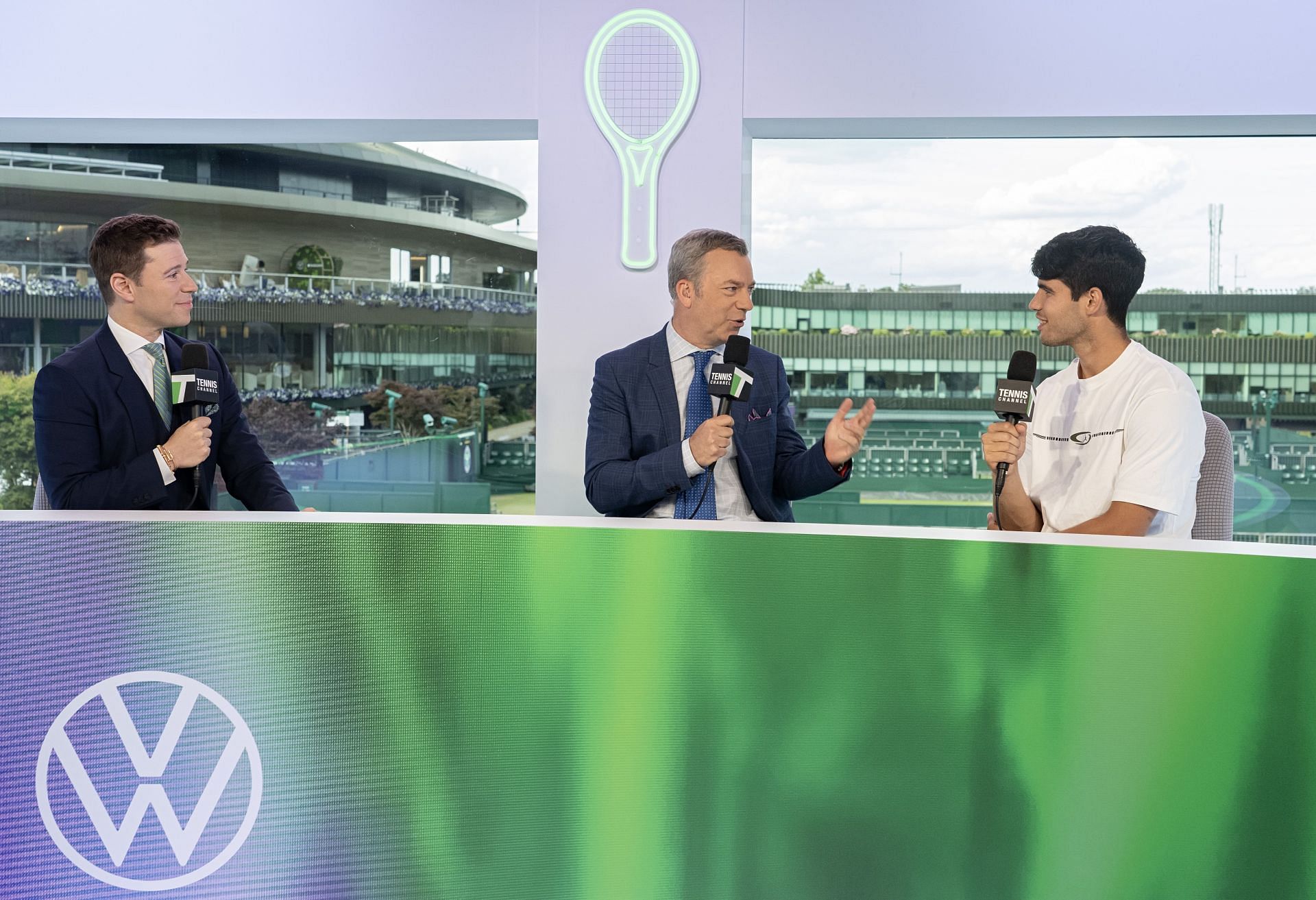 Steve Weissman (L), Jon Wertheim (center), and Carlos Alcaraz (R) during Tennis Channel&#039;s broadcast of the 2024 Wimbledon Championships (Source: Getty)