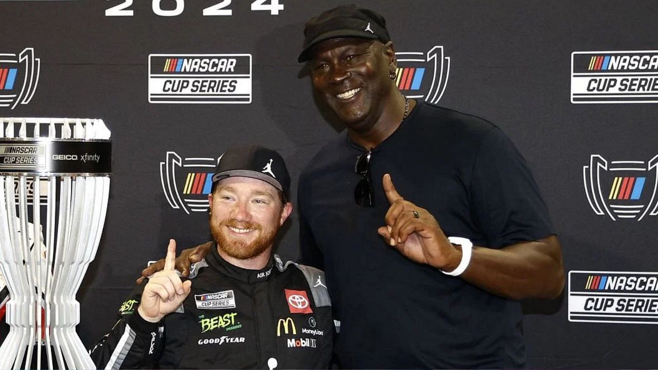 Michael Jordan poses with Tyler Reddick in victory lane after the latter won the regular season championship on September 01, 2024 at Darlington Raceway (Source: Getty)