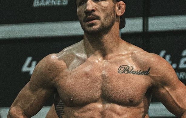 What does Michael Chandler&#039;s tattoo say?