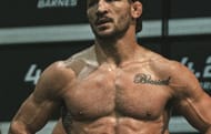 What does Michael Chandler's tattoo say?