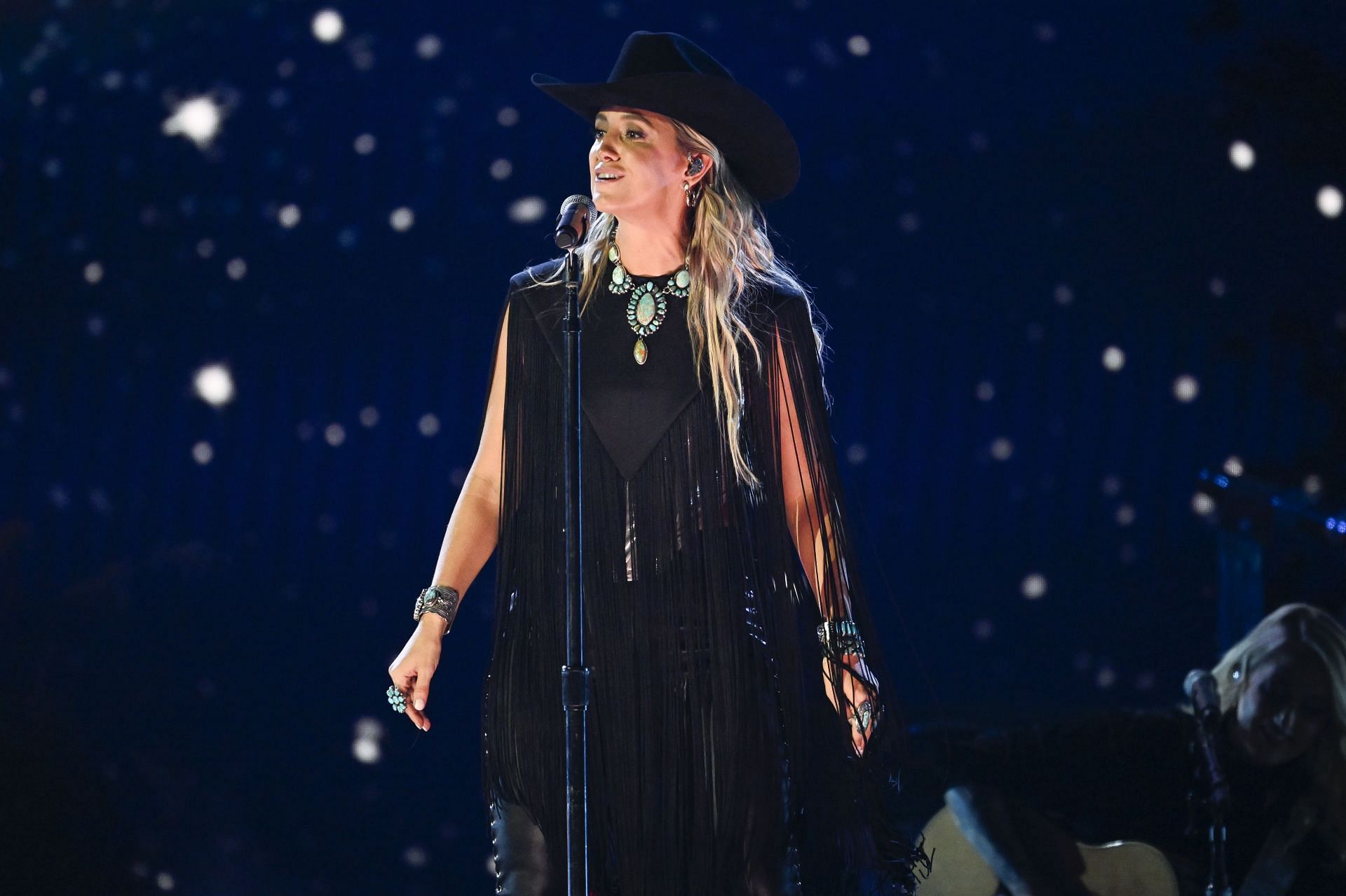 Lainey Wilson performs onstage during The 58th Annual CMA Awards (image via Getty)