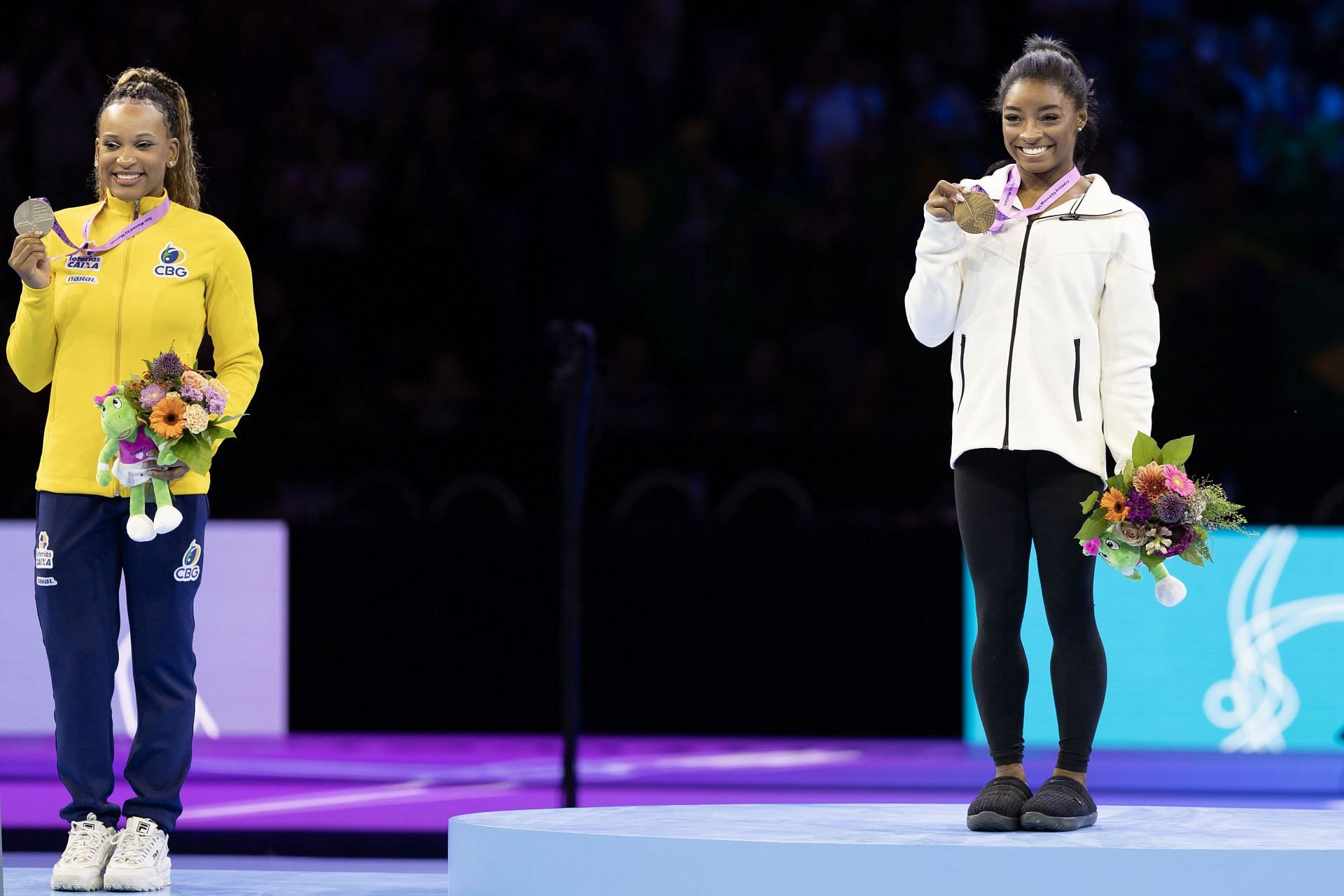 Simone Biles and Rebeca Andrade on the podium at the 2023 Artistic Gymnastics World Championships; (Source: Getty)