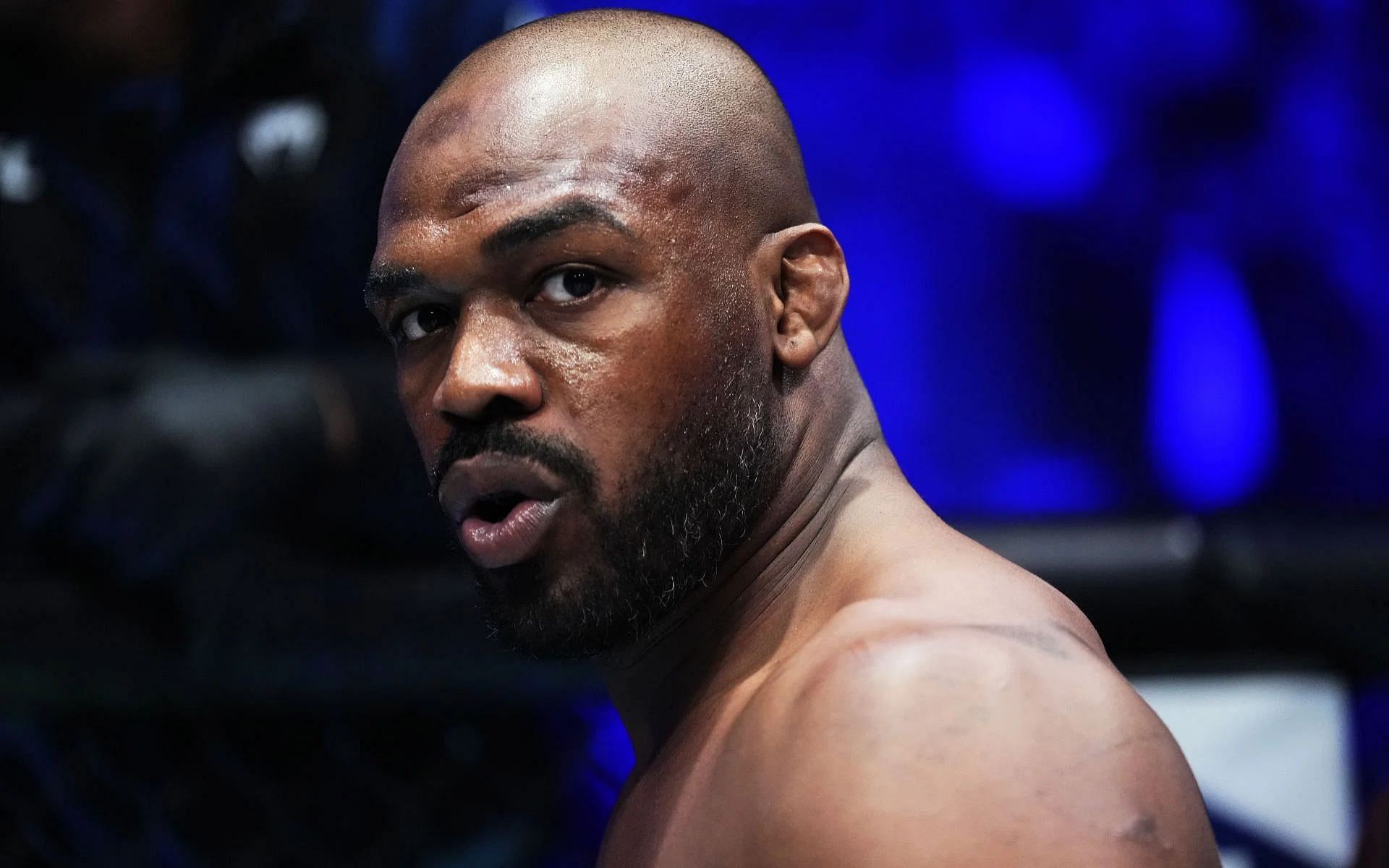 Jon Jones (pictured) walking out of interview due to potential Tom Aspinall questions sends fans into fits of rage [Image courtesy: Getty Images]