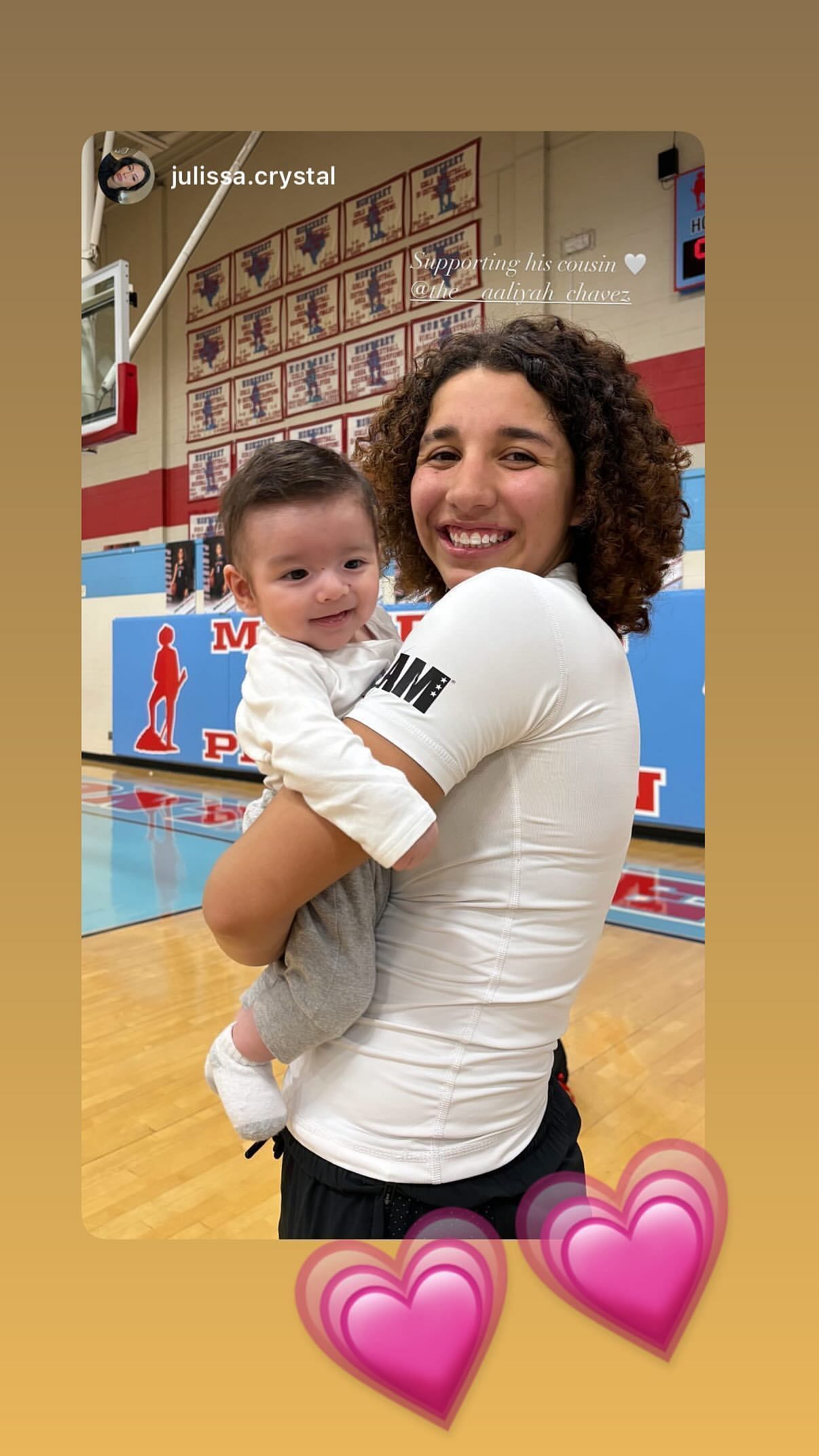 Aaliyah Chavez reshares an adorable photo with a fan at her high school game (image credit: instagram/the__aaliyah_chavez)