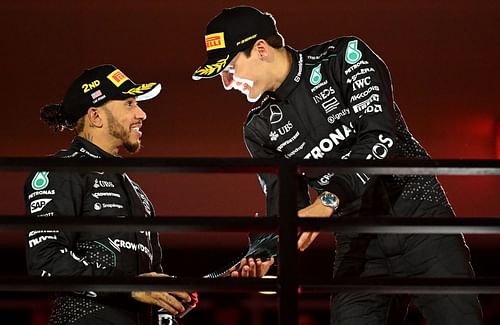 George Russell, right, speaks with his teammate and second place finisher Lewis Hamilton at the Formula One Las Vegas Grand Prix - Source: Getty Images