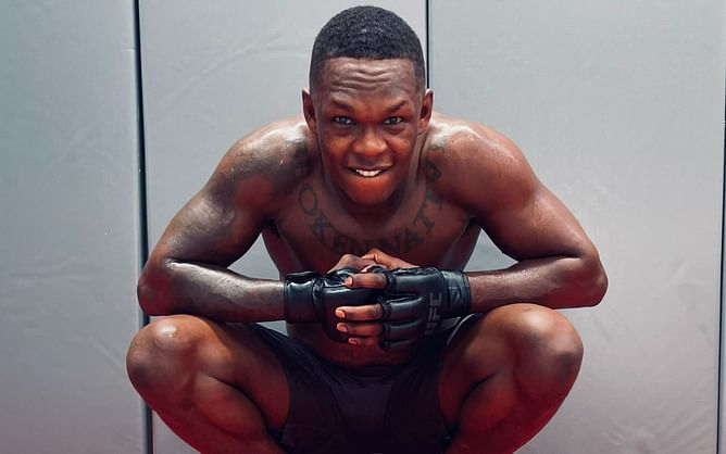 Photos and videos: Israel Adesanya spars, attends wedding, embraces 'Chill Guy' meme during visit to Colombia