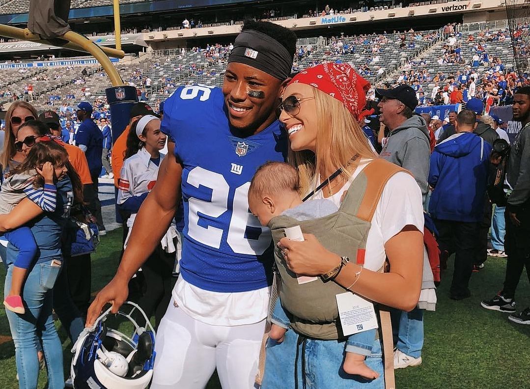 Saquon Barkley with girlfriend Anna Congdon and their son Saquon Barkley Jr.