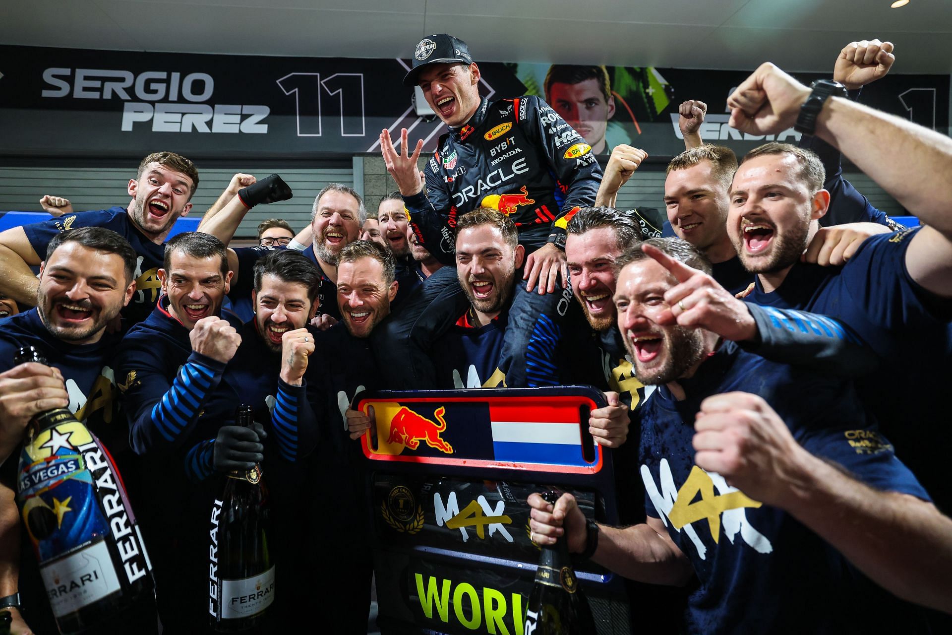 Max Verstappen of Netherlands and Oracle Red Bull Racing celebrates his fourth World Drivers' Championship with his crew in pit lane during the F1 Grand Prix of Las Vegas - Source: Getty Images