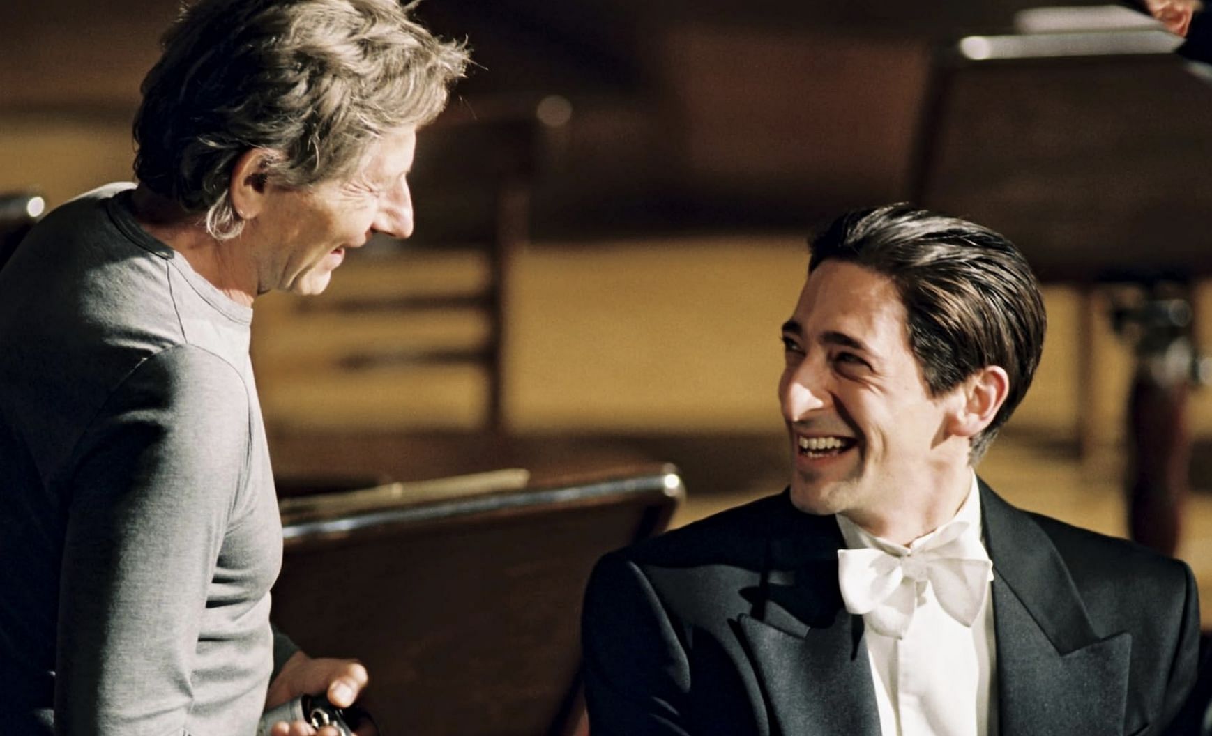 Roman Polanski and Adrien Brody in The Pianist (Image via Studio Canal, Focus Features)