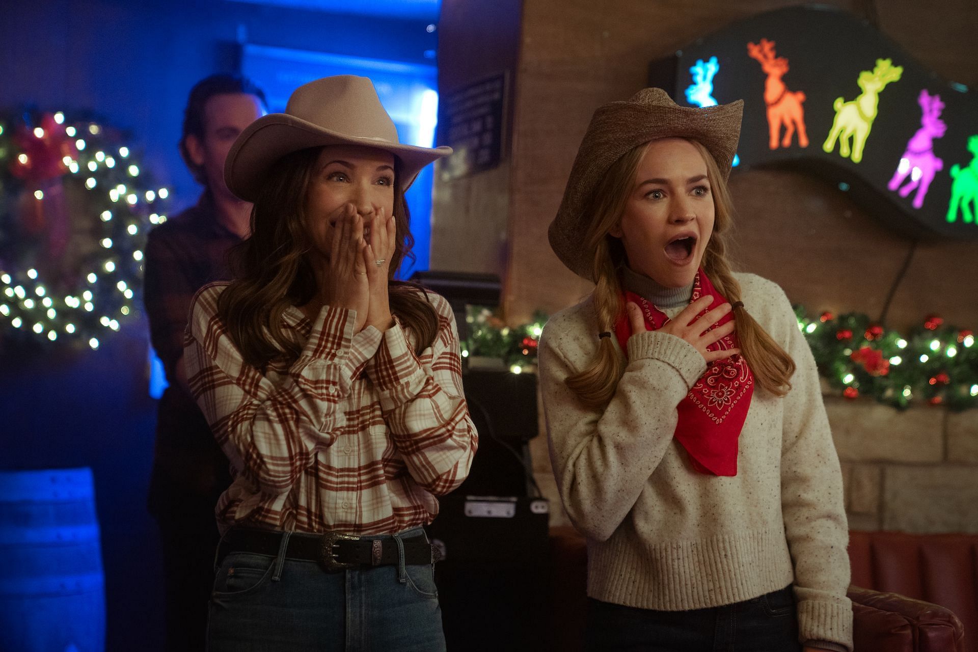 Marla Skoloff and Britt Robertson in The Merry Gentlemen (Image via Netflix)