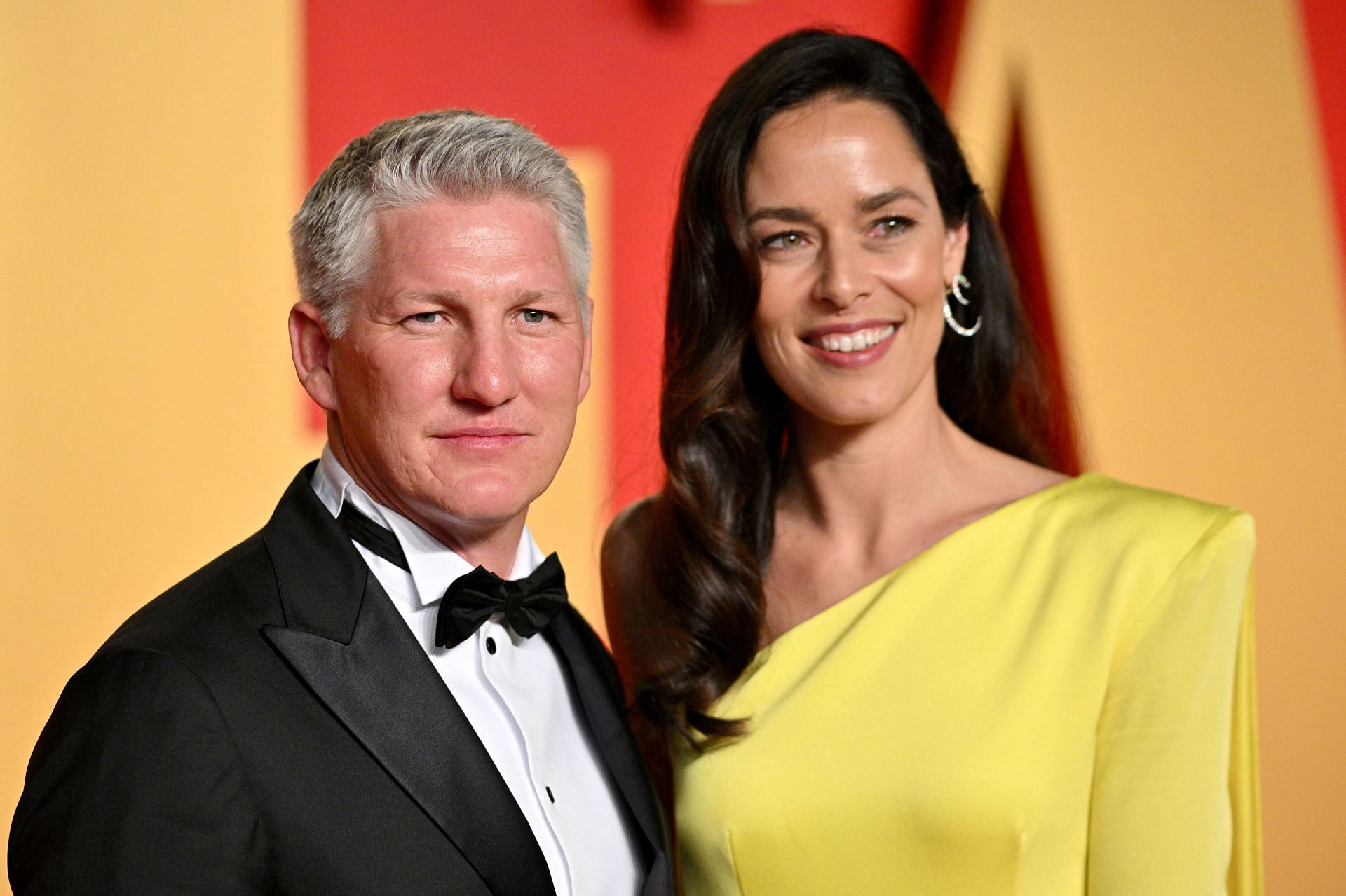 Ana Ivanovic poses with husband Bastian Schweinsteiger at 2024 Vanity Fair Oscar Party (Image via Getty)