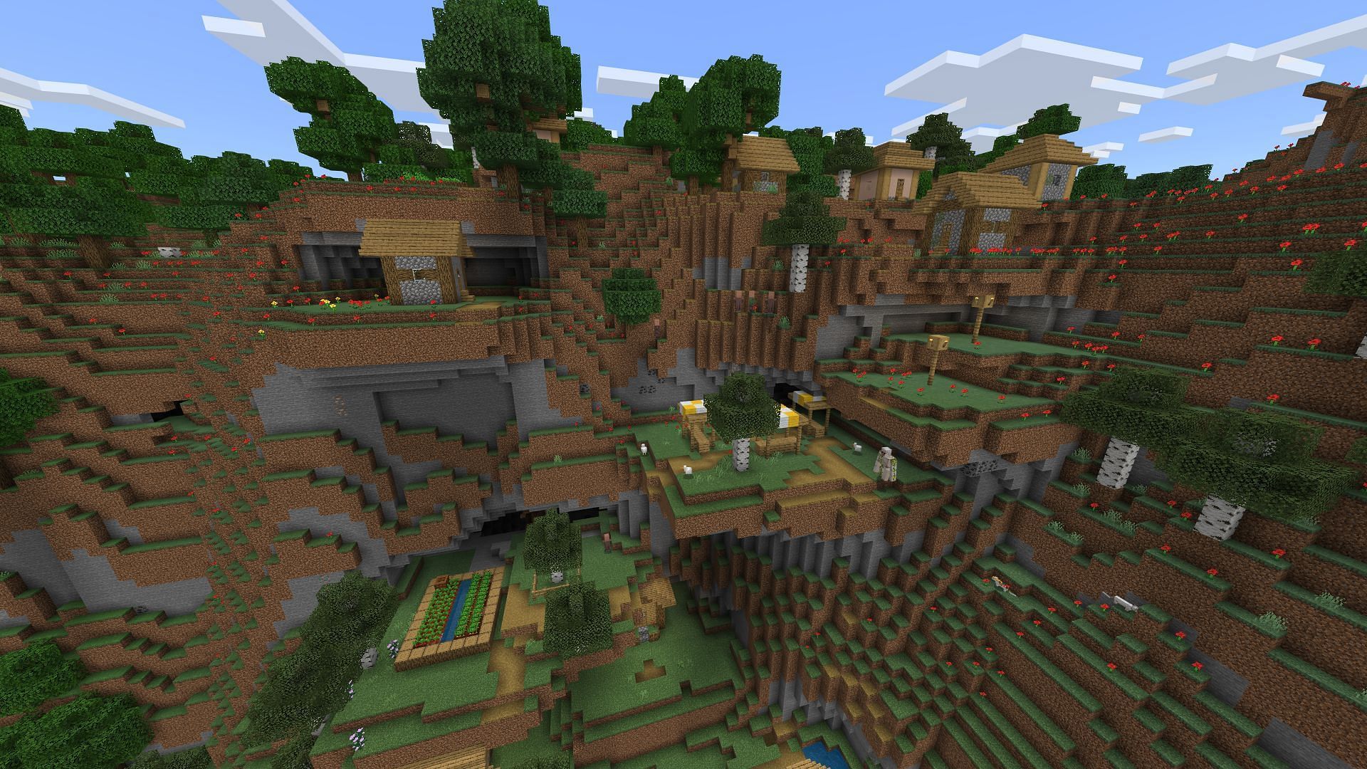 Cliffside Village&#039;s unique location and myriad of features make it one of the best Minecraft PE village seeds (Image via Mojang Studios)