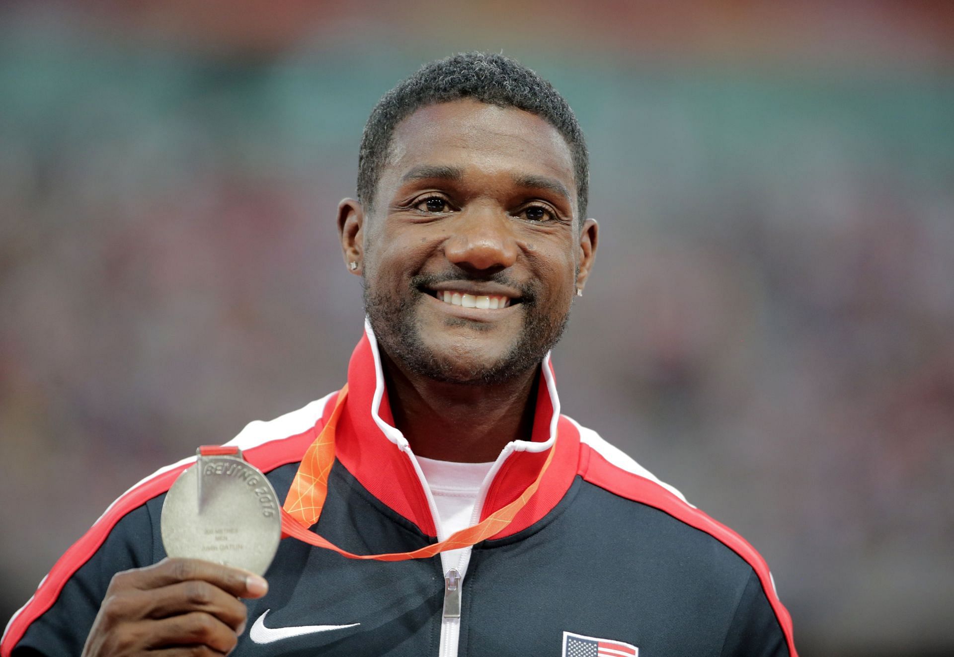 Justin Gatlin with his 200m silver medal at the 2015 IAAF World Championships in Beijing (Image via: Getty Images)