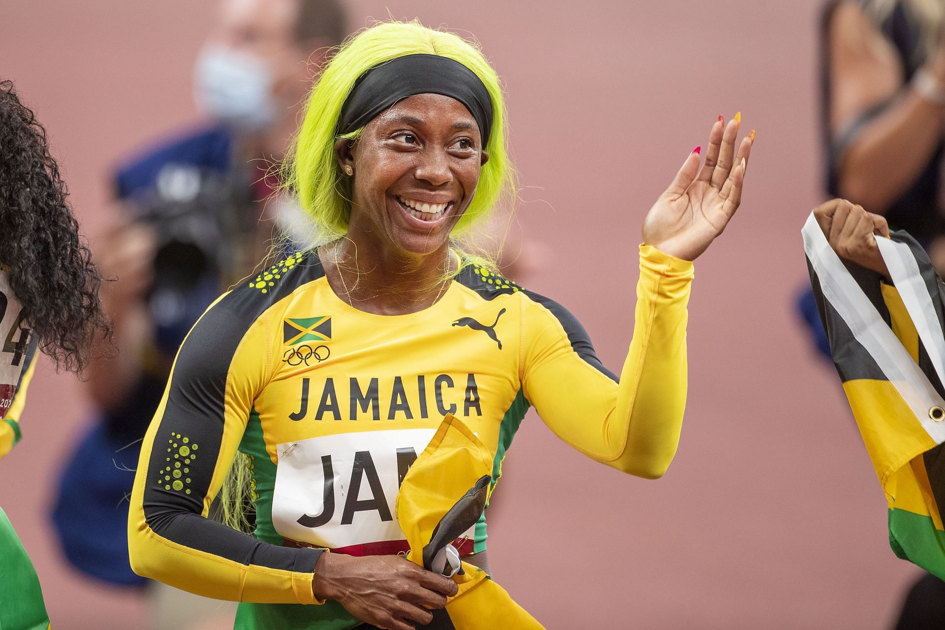 Shelly-Ann Fraser-Pryce of Jamaica celebrates the Jamaican teams gold medal win in the 4x 100m for women during the Track and Field competition at the 2020 Summer Olympic Games in Tokyo, Japan. (Photo via Getty Images)