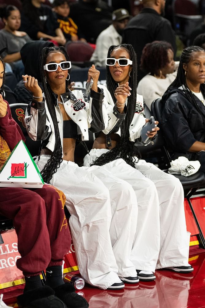 Photo: Sierra Canyon High School cheerleaders, the Combs twins, share birthday message for their father Sean 'Diddy' Combs