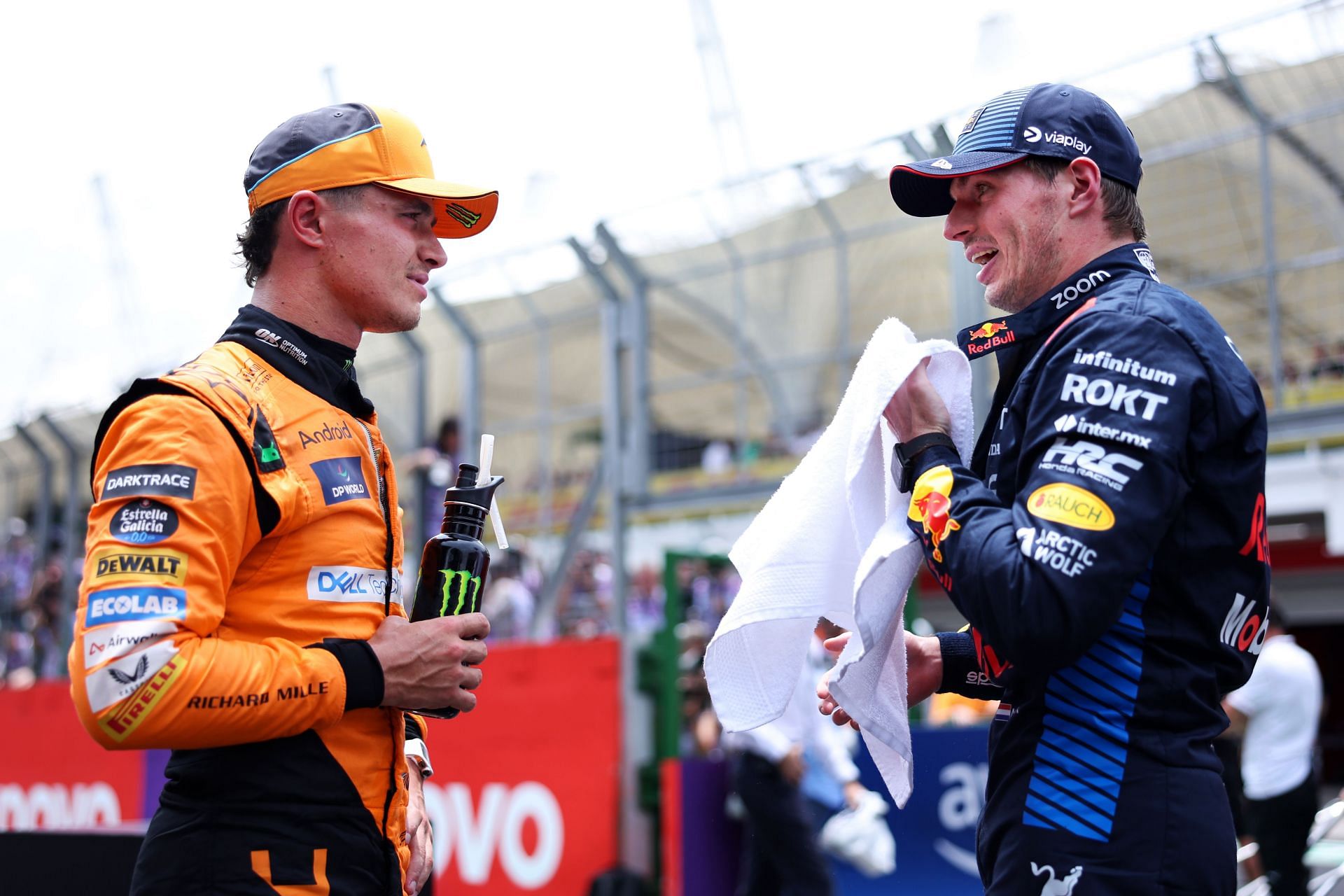 Lando Norris of Great Britain and McLaren and Max Verstappen of Red Bull Racing talk in parc ferme during F1 Grand Prix of Brazil - Sprint &amp; Qualifying - Source: Getty