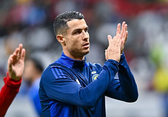 Cristiano Ronaldo makes classy gesture as he protects young pitch invader from security during Al-Nassr win over Damac