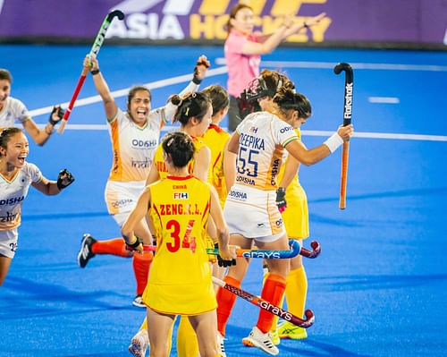 Indian players celebrate their goal