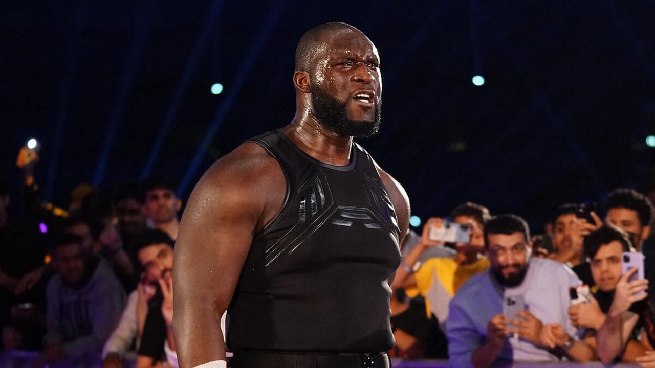 Omos (via WWE