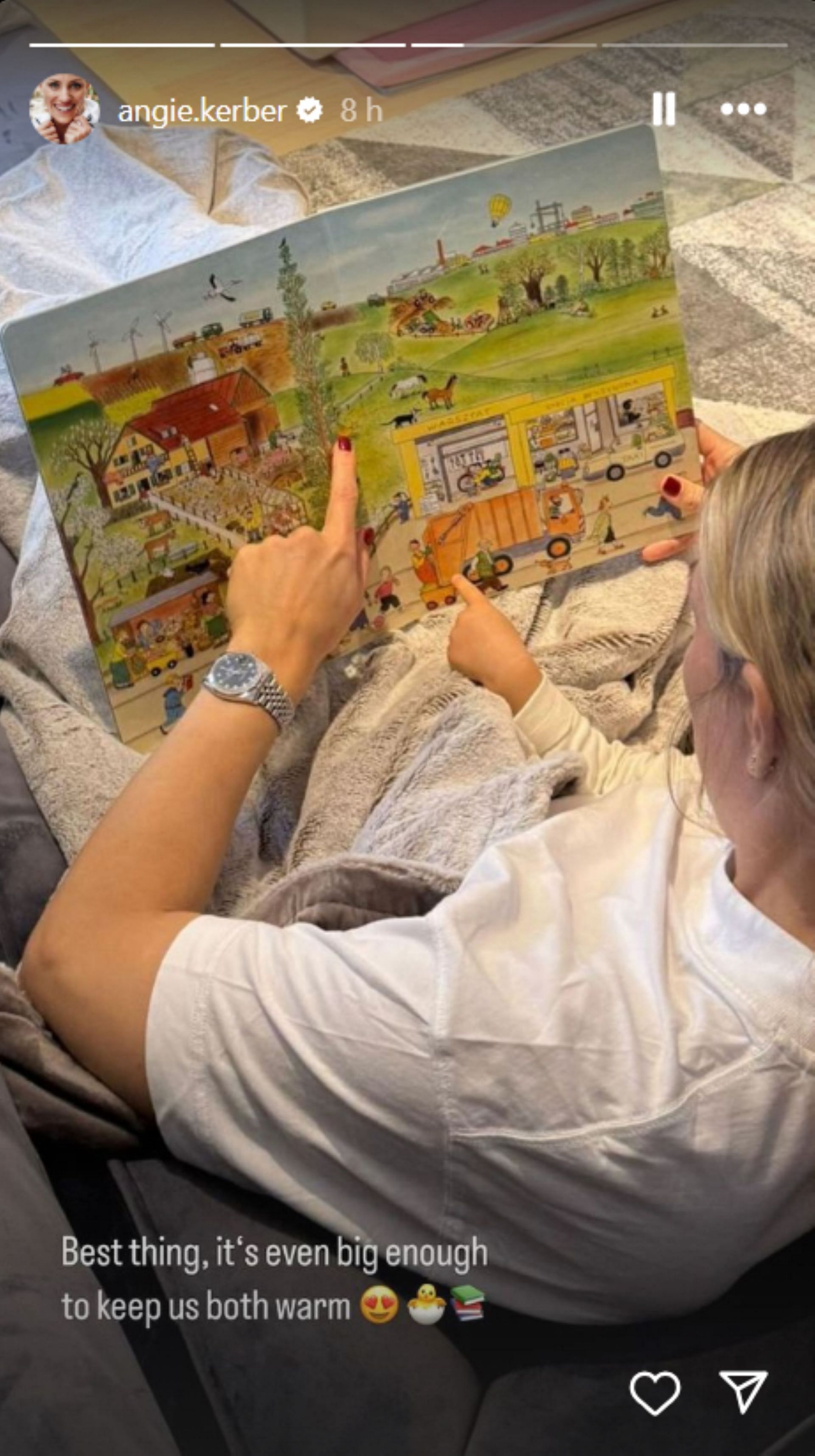 Angelique Kerber with her daughter Liana, reading a picture book; Instagram - @angie.kerber