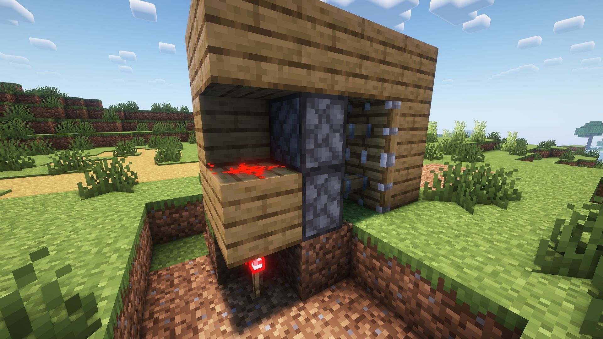 Regular blocks can be placed on sticky pistons that will act as the door (Image via Mojang Studios)