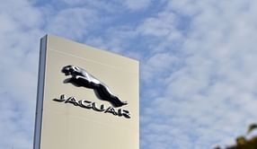 "Patience, the art’s in the reveal" — Jaguar's social media team responds defensively to negative comments from X users to its car-less ad