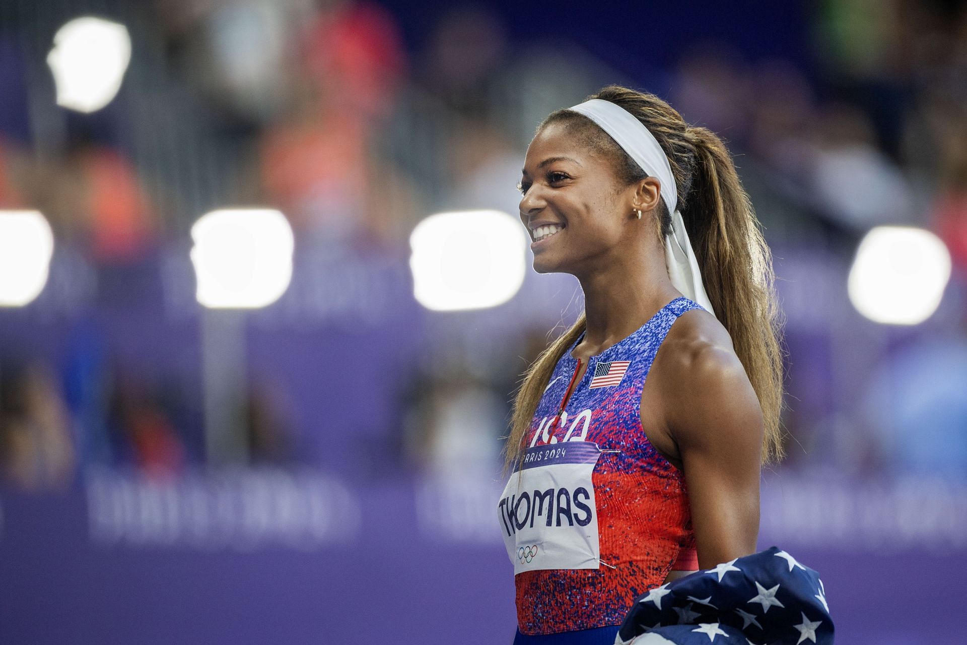 Gabby Thomas of the United States after the team&#039;s gold medal win in the Women&#039;s 4 x 100m Relay Final during the 2024 Summer Olympic Games in Paris, France. (Photo via Getty Images)