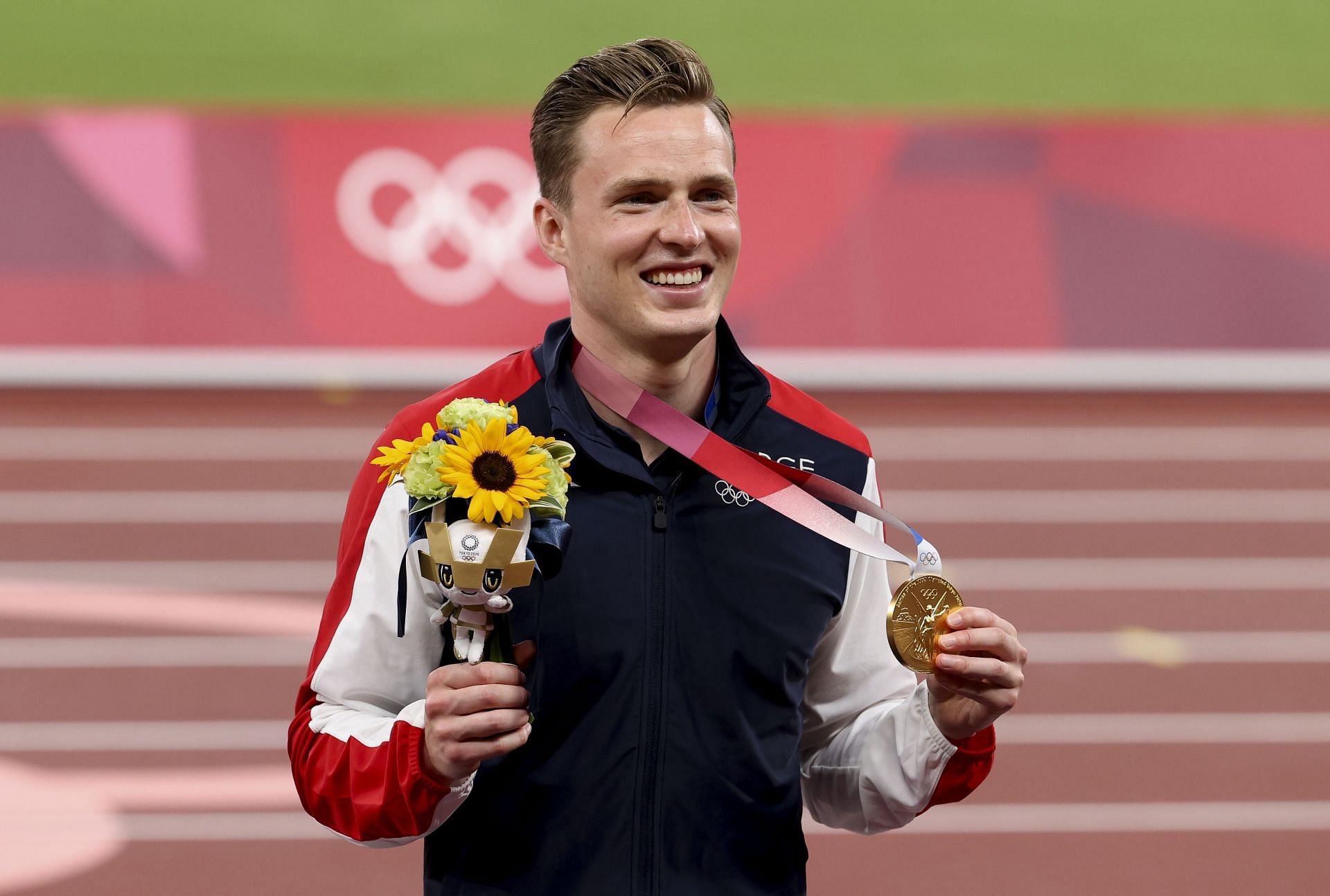 Karsten Warholm with his gold medal at the Tokyo 2020 Olympics (Photo by Jean Catuffe/Getty Images)