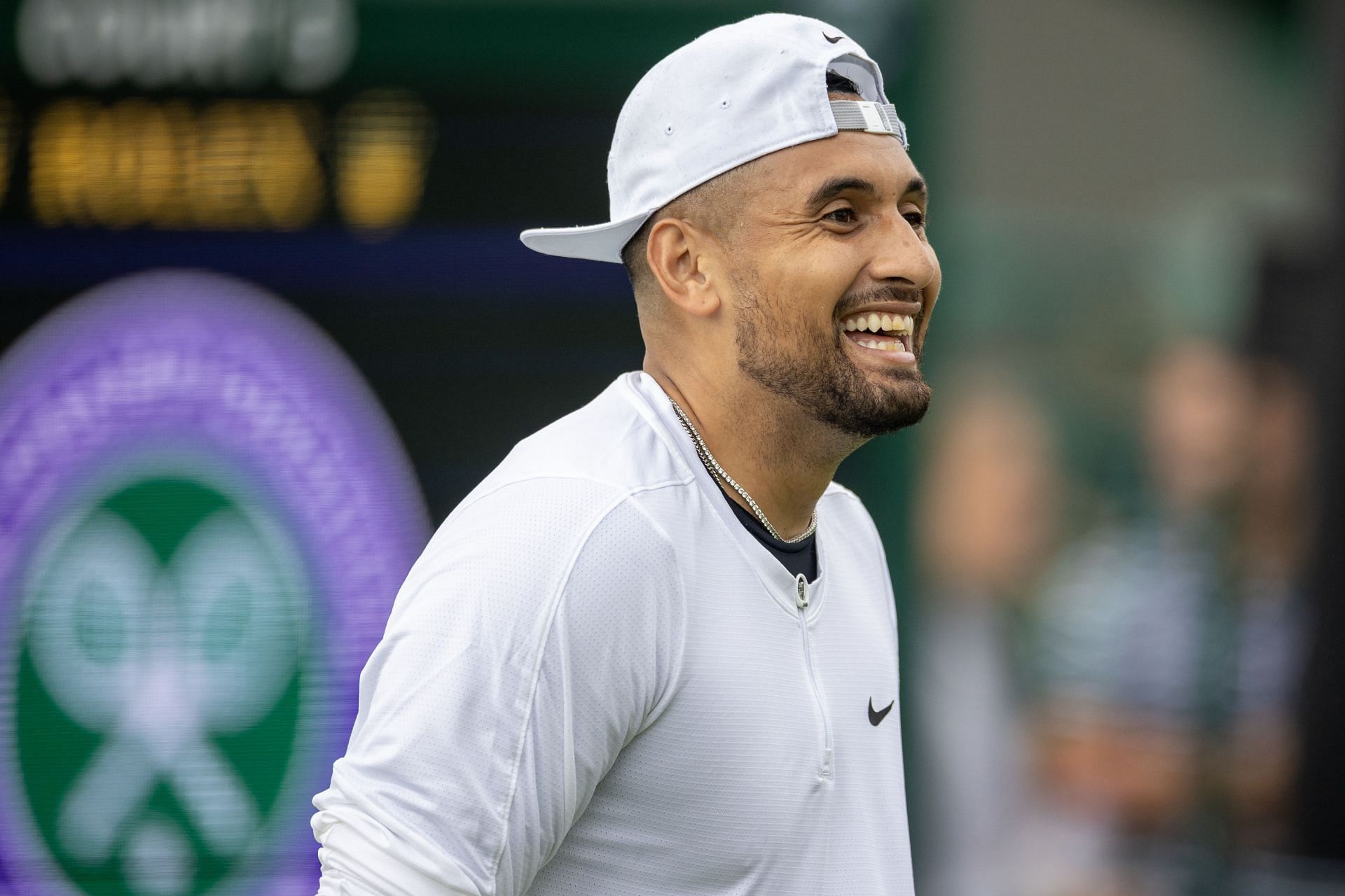 Nick Kyrgios beside the tennis court during the 2023 Wimbledon Championships (Image via: Getty Images)