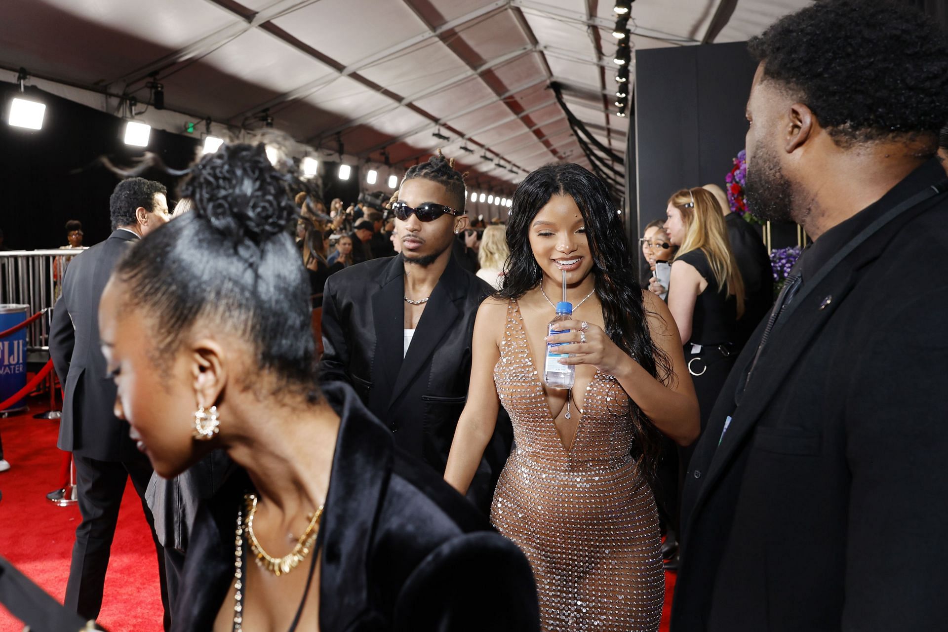 66th GRAMMY Awards - FIJI Water Arrivals - Source: Getty