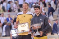 Alexander Zverev (L) and Carlos Alcaraz with their 2024 French Open trophies (Image: Getty)