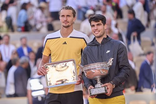 Alexander Zverev (L) and Carlos Alcaraz with their 2024 French Open trophies (Image: Getty)