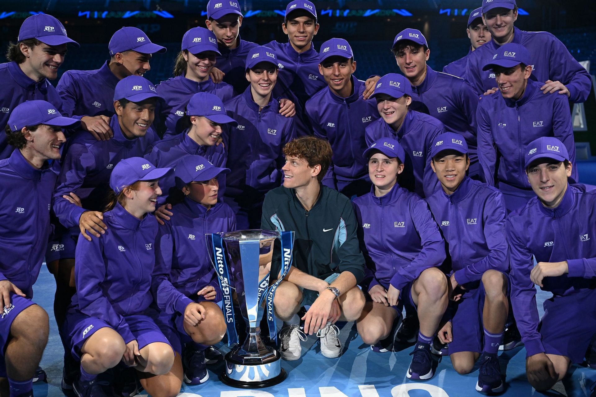 Jannik Sinner poses with ball kids at the 2024 ATP Finals - Source: Getty