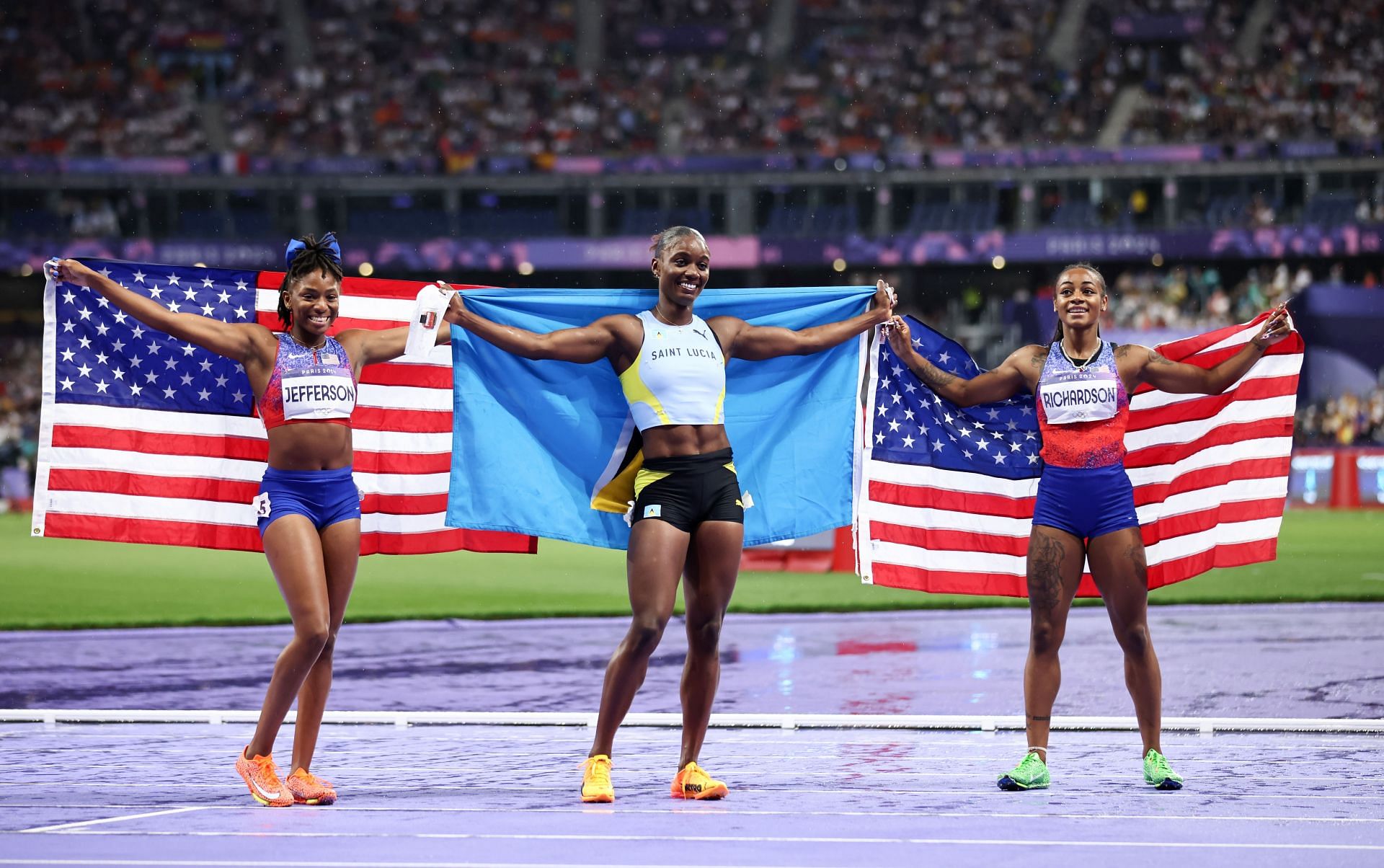 Julien Alfred with her fellow 100m medalists in Paris (Image Source: Getty)