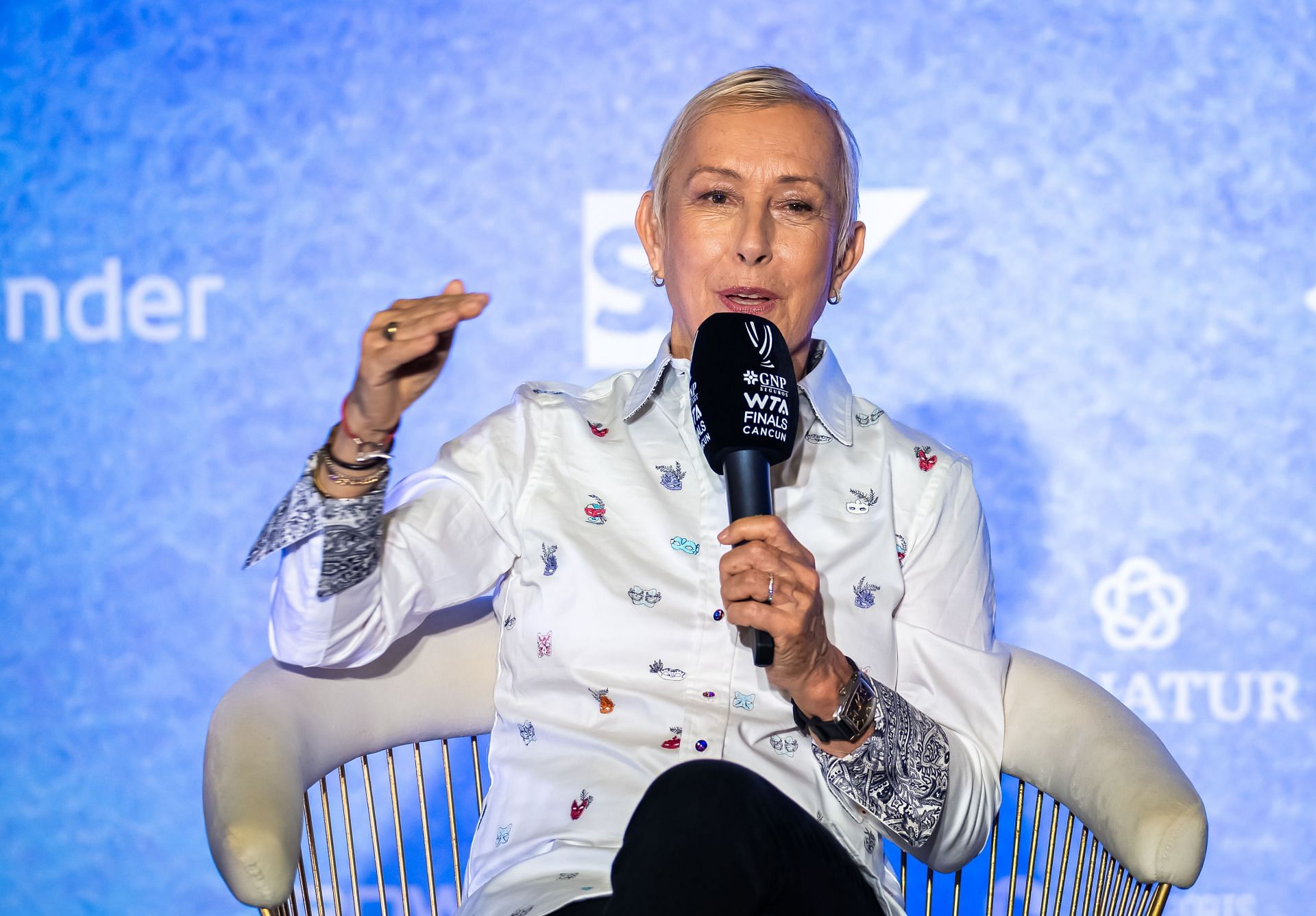 Martina Navratilova pictured speaking to the press [Image Source: Getty Images]