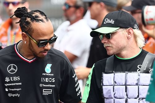 Lewis Hamilton (L) of Mercedes and Valtteri Bottas of Kick Sauber at the drivers parade ahead of the Formula 1 Hungarian Grand Prix (Picture credit: via Getty Images)