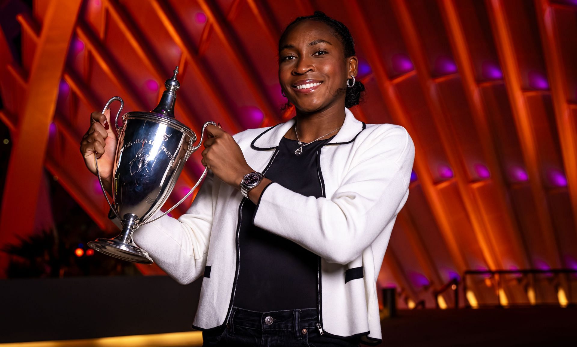 Coco Gauff poses with the 2024 WTA Finals trophy