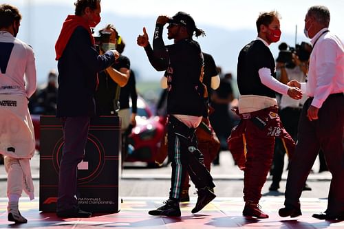 Lewis Hamilton and Ferrari's John Elkann at F1 Grand Prix of Tuscany - Source: Getty