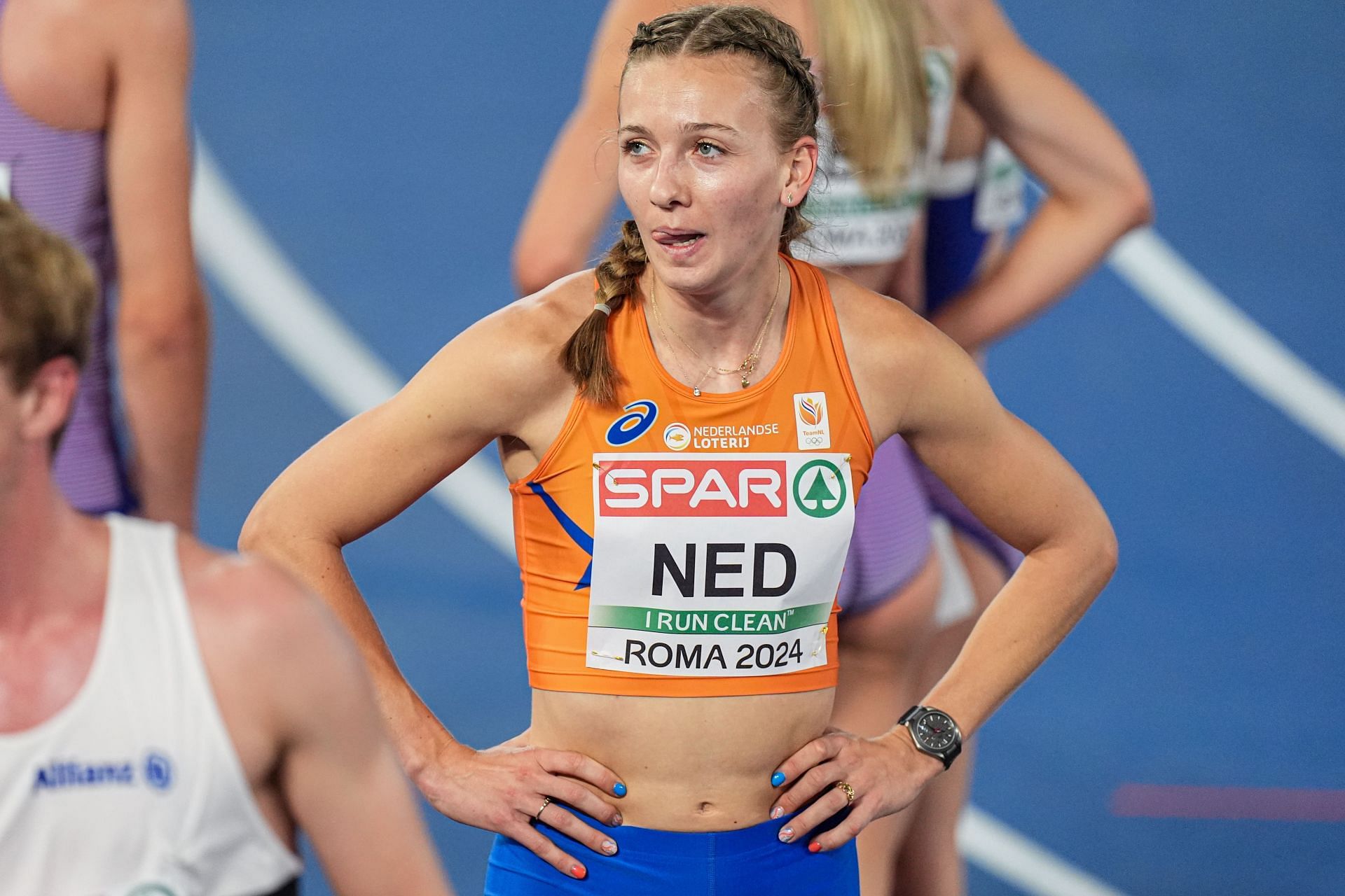 Bol wearing a orange top during a race on the first day of the 26th European Athletics Championships (Image via: Getty Images)