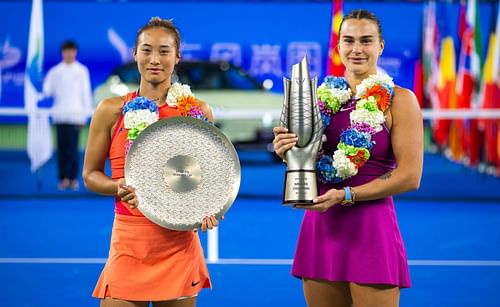 Zheng Qinwen and Aryna Sabalenka with the 2024 Wuhan Open trophies. (Source: Getty)