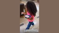 Dixon shares a video of her daughter holding a bowl of Dippin' Dots. (Credits: @kkdixonnn/Instagram)