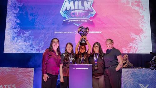 Team Moxie lifts the trophy with Yin Woon Rani and Jen Grubb (Image via The Milk Cup)