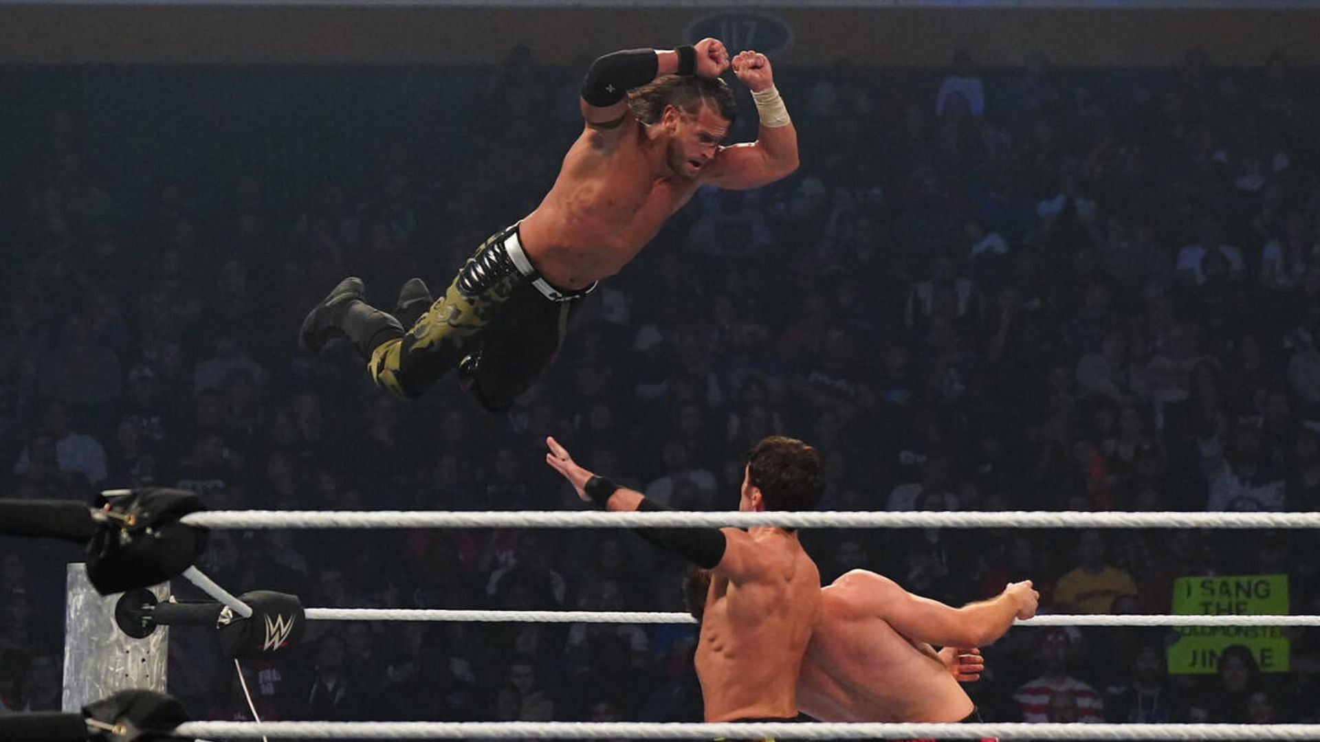 MCMG hitting the Skull and Bone finishing move on SmackDown. [Image via WWE.com]