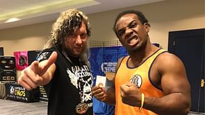 Xavier Woods reacts after Kenny Omega takes a massive dig at him