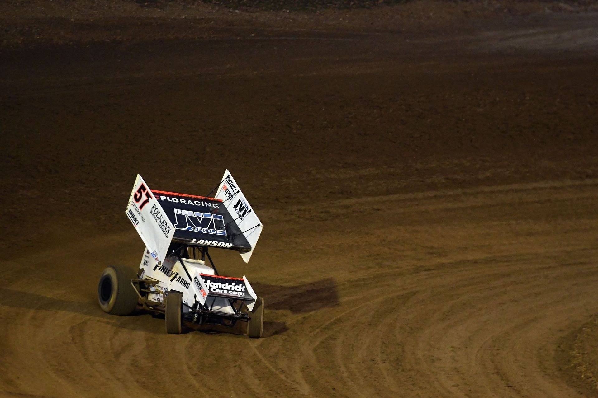 Kyle Larson (57) of Paul Silva Motorsports Chevrolet drives off - Source: Getty