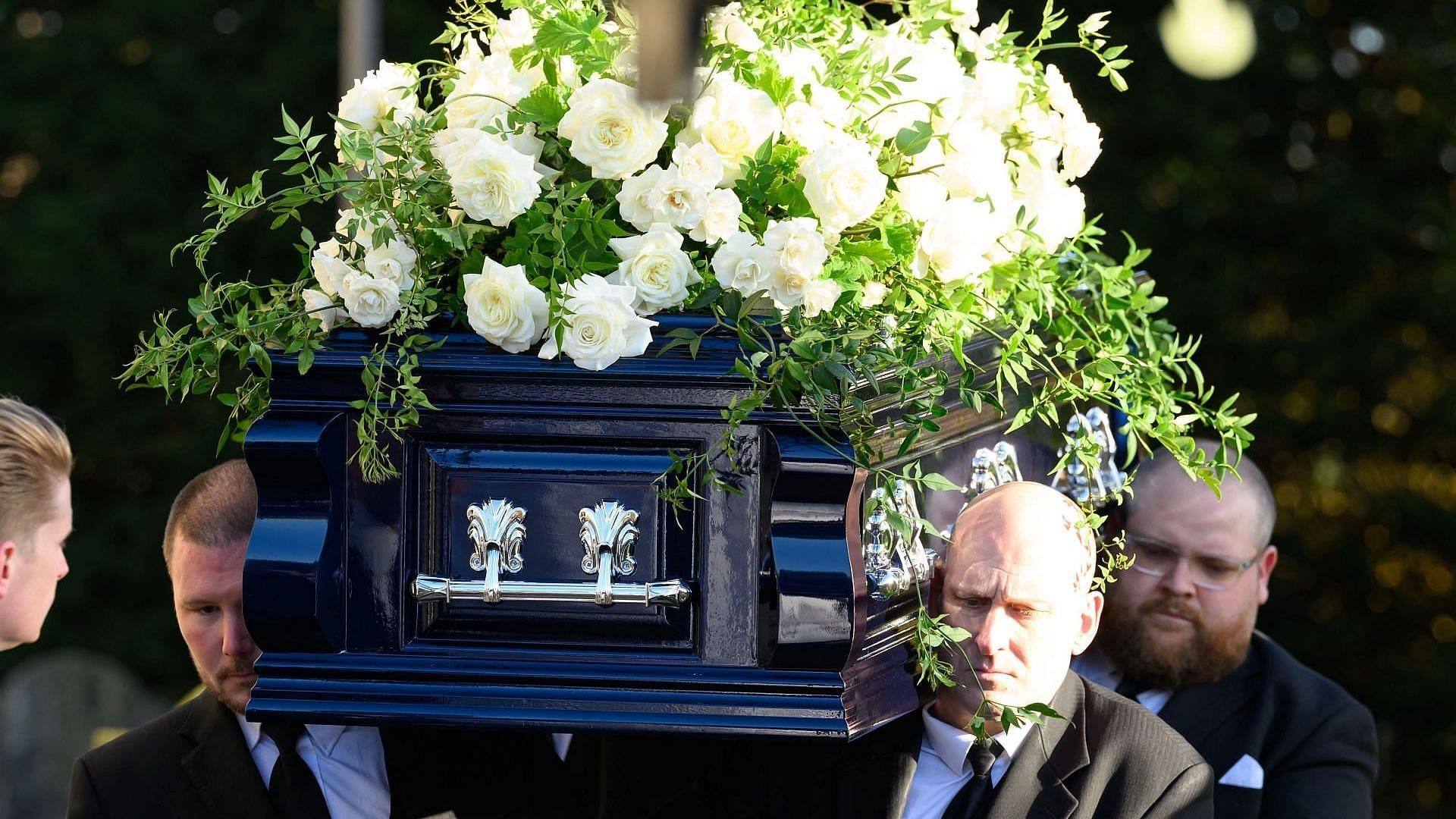 Pallbearers carry the coffin of former member of One Direction singer Liam Payne at his funeral on November 20, 2024, in Amersham, England. (Image via Getty/Karwai Tang)