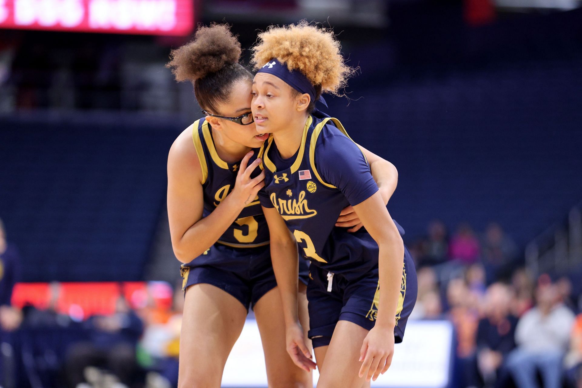 Olivia Miles (#5) and Hannah Hidalgo (#3) of the Notre Dame Fighting Irish embrace during the first half against the Syracuse Orange on December 08, 2024 in Syracuse, New York. Photo: Getty